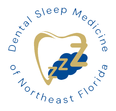 The image is a logo for the Sleep Medicine of Northeast Florida. It features a stylized graphic of a sleep mask, symbolizing sleep medicine, and includes text that reads Dental Sleep Medicine and Northeast Florida, indicating the name of the organization and its location.
